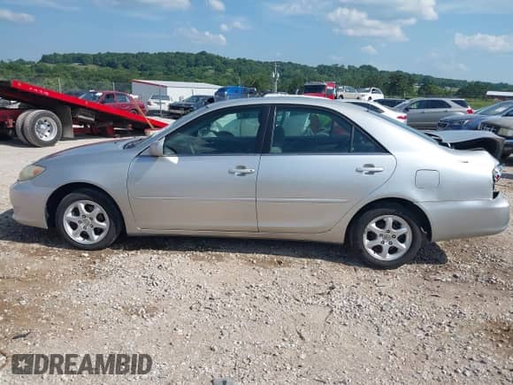 2005 Toyota Camry STD with VIN 4T1BE32K95U414156, listed as a IAAI auction lot 42774820 with 203,235 mi miles and . Bid and sale history available at DreamBid. Image 14.