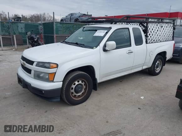 2011 Chevrolet Colorado Work Truck with VIN 1GCESBF96B8107091, listed as a IAAI auction lot 41490760 with 114,711 mi miles and . Bid and sale history available at DreamBid. Image 2.