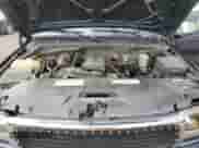 1999 GMC Sierra 1500 SL with VIN 1GTEK19TXXE506578, listed as a Copart auction lot 85857155 with 180,128 mi miles and Salvage title. Bid and sale history available at DreamBid. Image 11.