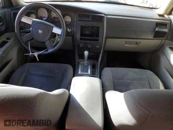 2007 Dodge Charger Police z VIN 2B3KA43GX7H801757, wystawiony jako Copart lot #86750624 z przebiegiem 218 271 mil mil oraz Szkoda całkowita • Salvage title. Historia ofert i sprzedaży dostępna na DreamBid. Obrazek 8.