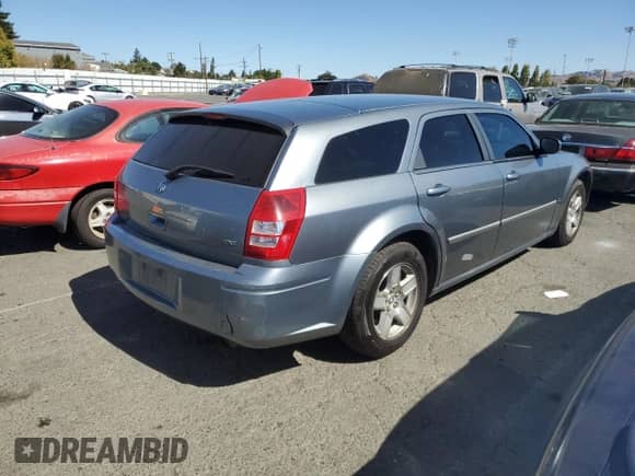 2007 Dodge Magnum with VIN 2D4FV47VX7H705210, listed as a Copart auction lot 69976664 with Not provided miles and Salvage title. Bid and sale history available at DreamBid. Image 3.