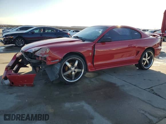 1996 Ford Mustang z VIN 1FALP4041TF234741, wystawiony jako Copart lot #85277894 z przebiegiem 113 353 mil mil oraz Szkoda całkowita • Salvage title. Historia ofert i sprzedaży dostępna na DreamBid. Obrazek 1.