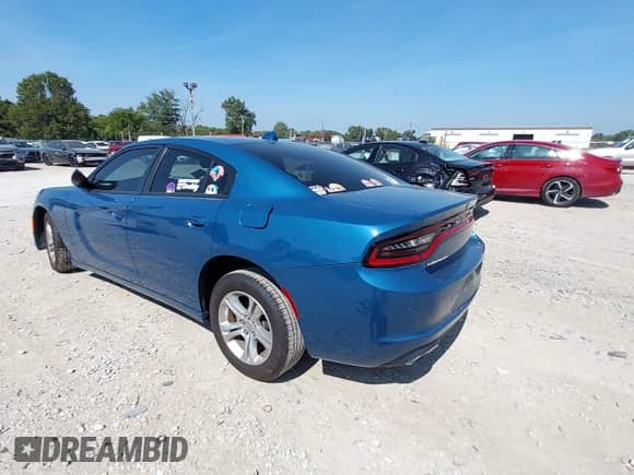 2023 Dodge Charger SXT with VIN 2C3CDXBG7PH660986, listed as a IAAI auction lot 43233732 with 23,404 mi miles and . Bid and sale history available at DreamBid. Image 3.