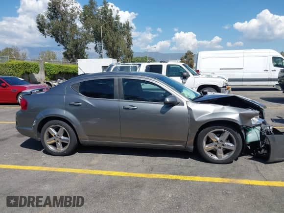 2012 Dodge Avenger SXT Plus with VIN 1C3CDZEG6CN325811, listed as a IAAI auction lot 43247091 with 200,293 mi miles and . Bid and sale history available at DreamBid. Image 13.