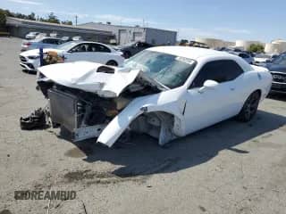 2019 Dodge Challenger SXT with VIN 2C3CDZAG0KH727725, listed as a Copart auction lot 70292555 with 90,100 mi miles and Salvage title. Bid and sale history available at DreamBid. Image 1.