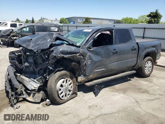 2025 Toyota Tacoma SR5 with VIN 3TMKB5FN1SM038291, listed as a Copart auction lot 64888865 with 3,992 mi miles and Salvage title. Bid and sale history available at DreamBid. Image 1.