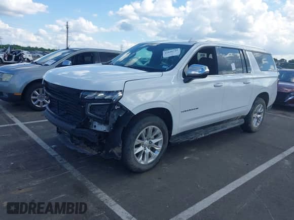 2023 Chevrolet Suburban Premier z VIN 1GNSKFKD9PR277989, wystawiony jako IAAI lot #42840745 z przebiegiem 79 299 mil mil oraz . Historia ofert i sprzedaży dostępna na DreamBid. Obrazek 17.