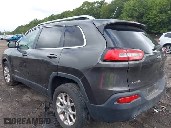 2014 Jeep Cherokee Latitude with VIN 1C4PJMCS5EW200506, listed as a IAAI auction lot 43158630 with 148,814 mi miles and . Bid and sale history available at DreamBid. Image 3.