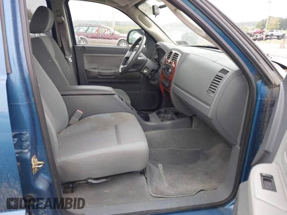 2005 Dodge Dakota SLT with VIN 1D7HW48N45S269497, listed as a IAAI auction lot 43231008 with 375,174 mi miles and . Bid and sale history available at DreamBid. Image 5.