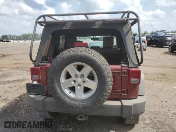 2007 Jeep Wrangler Unlimited Rubicon with VIN 1J8GA69147L164363, listed as a Copart auction lot 66124465 with 142,365 mi miles and Clean title. Bid and sale history available at DreamBid. Image 6.