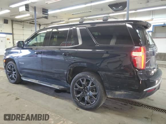 2023 Chevrolet Tahoe LT с VIN 1GNSKNKTXPR357772, выставлен на аукционе Copart как лот 46880395 с пробегом 51 428 миль миль и Списание • Salvage title. История ставок и продаж доступна на DreamBid. Изображение 2.