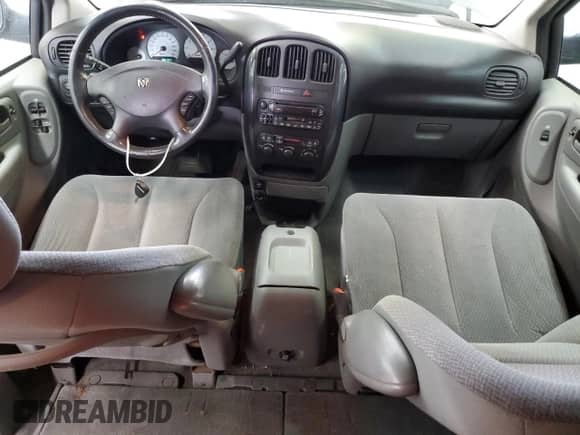 2005 Dodge Caravan SXT with VIN 2D4GP44L55R301353, listed as a Copart auction lot 84602885 with 182,121 mi miles and Salvage title. Bid and sale history available at DreamBid. Image 8.