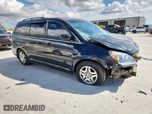 2007 Honda Odyssey EX-L z VIN 5FNRL38627B056882, wystawiony jako Copart lot #82173585 z przebiegiem 214 207 mil mil oraz Szkoda całkowita • Salvage title. Historia ofert i sprzedaży dostępna na DreamBid. Obrazek 4.
