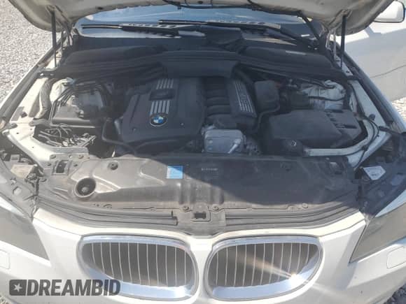 2009 BMW 5 Series 528i z VIN WBANU53559C122487, wystawiony jako Copart lot #69512515 z przebiegiem Nie podano mil oraz Szkoda całkowita • Salvage title. Historia ofert i sprzedaży dostępna na DreamBid. Obrazek 11.