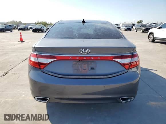 2013 Hyundai Azera с VIN KMHFH4JGXDA322985, выставлен на аукционе Copart как лот 74611094 с пробегом 79 230 миль миль и Чистый • Clean title. История ставок и продаж доступна на DreamBid. Изображение 6.
