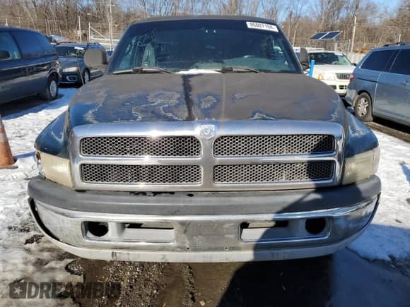 1999 Dodge 1500 with VIN 3B7HC12Y8XG208040, listed as a Copart auction lot 86807104 with 387,576 mi miles and Salvage title. Bid and sale history available at DreamBid. Image 5.