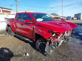 2024 Toyota Tacoma SR5 with VIN 3TYLB5JN1RT001686, listed as a IAAI auction lot 41071582 with 5,986 mi miles and . Bid and sale history available at DreamBid. Image 1.