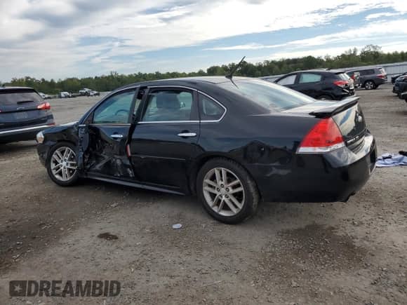 2012 Chevrolet Impala LTZ with VIN 2G1WC5E39C1225424, listed as a Copart auction lot 84376665 with 181,167 mi miles and Salvage title. Bid and sale history available at DreamBid. Image 2.