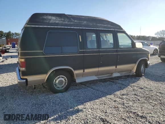 1992 Ford Econoline Cargo с VIN 1FDEE14N0NHB21568, выставлен на аукционе Copart как лот 86055234 с пробегом 93 945 миль миль и Чистый • Clean title. История ставок и продаж доступна на DreamBid. Изображение 3.