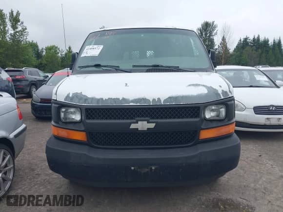 2003 Chevrolet Express Cargo z VIN 1GCFG15X931104065, wystawiony jako IAAI lot #42408572 z przebiegiem 153 653 mil mil oraz . Historia ofert i sprzedaży dostępna na DreamBid. Obrazek 11.