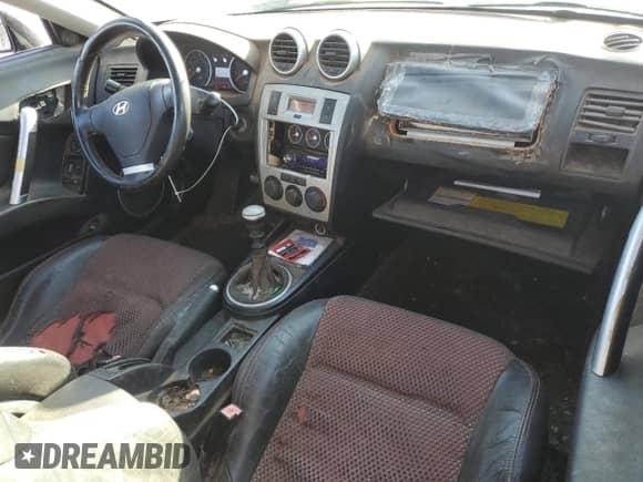 2006 Hyundai Tiburon GT with VIN KMHHN65F76U197234, listed as a Copart auction lot 52775705 with 127,581 mi miles and Clean title. Bid and sale history available at DreamBid. Image 8.