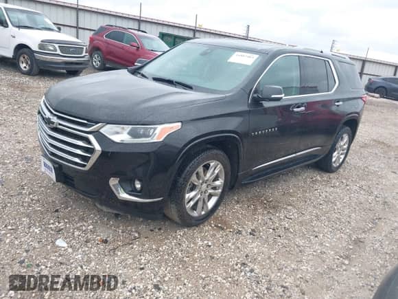 2021 Chevrolet Traverse High Country z VIN 1GNEVNKW4MJ165059, wystawiony jako IAAI lot #41887403 z przebiegiem 92 519 mil mil oraz . Historia ofert i sprzedaży dostępna na DreamBid. Obrazek 17.