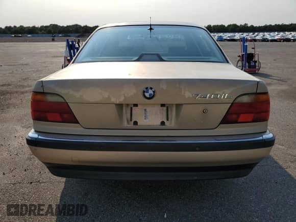 1997 BMW 7 Series 740iL with VIN WBAGJ8325VDM04352, listed as a Copart auction lot 70189534 with 129,463 mi miles and Salvage title. Bid and sale history available at DreamBid. Image 6.