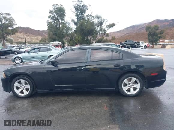 2014 Dodge Charger SE with VIN 2C3CDXBG0EH300844, listed as a IAAI auction lot 43406194 with 327,639 mi miles and . Bid and sale history available at DreamBid. Image 14.