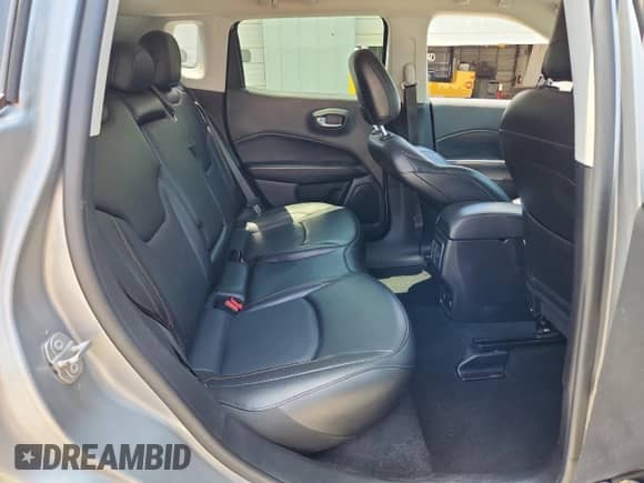 2020 Jeep Compass Limited with VIN 3C4NJCCB2LT187511, listed as a Copart auction lot 63769235 with 100,436 mi miles and Salvage title. Bid and sale history available at DreamBid. Image 11.