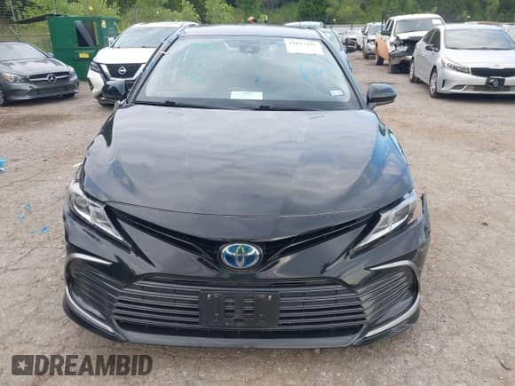 2022 Toyota Camry Hybrid LE with VIN 4T1C31AK3NU585808, listed as a IAAI auction lot 42633297 with 34,066 mi miles and . Bid and sale history available at DreamBid. Image 12.