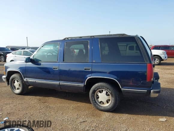 1995 Chevrolet Tahoe z VIN 1GNEC13K7SJ427888, wystawiony jako IAAI lot #42703275 z przebiegiem 251 895 mil mil oraz . Historia ofert i sprzedaży dostępna na DreamBid. Obrazek 14.