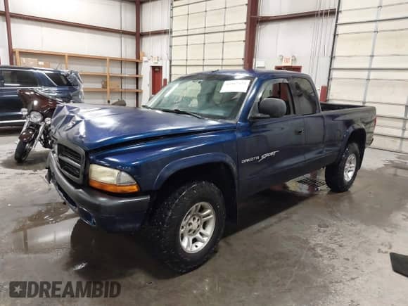 2001 Dodge Dakota Sport with VIN 1B7GG22N31S223895, listed as a IAAI auction lot 43367373 with Not provided miles and . Bid and sale history available at DreamBid. Image 2.