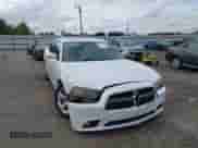 2014 Dodge Charger SXT with VIN 2C3CDXHG3EH138196, listed as a IAAI auction lot 43327294 with 275,930 mi miles and . Bid and sale history available at DreamBid. Image 1.