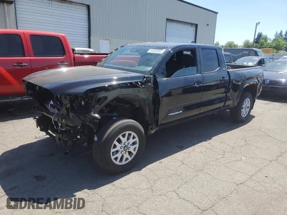 2024 Toyota Tacoma TRD Off Road with VIN 3TMLB5JN1RM085942, listed as a Copart auction lot 64483585 with 1,975 mi miles and Salvage title. Bid and sale history available at DreamBid. Image 1.