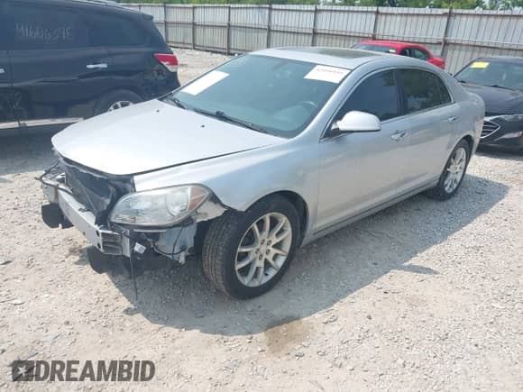 2012 Chevrolet Malibu LTZ z VIN 1G1ZG5E79CF205302, wystawiony jako IAAI lot #42416939 z przebiegiem 186 716 mil mil oraz . Historia ofert i sprzedaży dostępna na DreamBid. Obrazek 2.