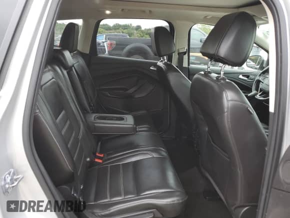 2017 Ford Escape Titanium с VIN 1FMCU9JD7HUE50719, выставлен на аукционе Copart как лот 80200705 с пробегом 127 463 миль миль и Чистый • Clean title. История ставок и продаж доступна на DreamBid. Изображение 11.