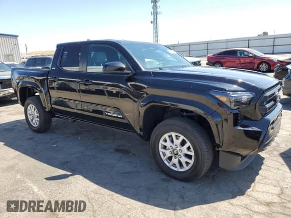 2024 Toyota Tacoma SR5 with VIN 3TMLB5JNXRM054298, listed as a Copart auction lot 66528135 with 5,976 mi miles and Salvage title. Bid and sale history available at DreamBid. Image 4.