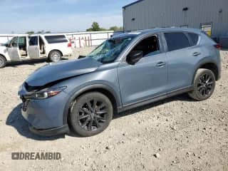 2023 Mazda CX-5 S Carbon Edition z VIN JM3KFBCM2P0137783, wystawiony jako Copart lot #81884955 z przebiegiem Nie podano mil oraz Nie do naprawy • Non repairable. Historia ofert i sprzedaży dostępna na DreamBid. Obrazek 1.