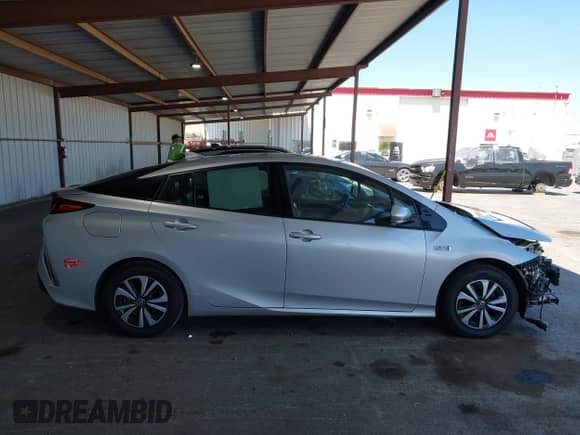 2018 Toyota Prius Plus z VIN JTDKARFP9J3078890, wystawiony jako IAAI lot #42617146 z przebiegiem 59 270 mil mil oraz . Historia ofert i sprzedaży dostępna na DreamBid. Obrazek 14.