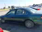 2002 Honda Accord LX with VIN JHMCG66522C014027, listed as a IAAI auction lot 42910646 with 225,058 mi miles and . Bid and sale history available at DreamBid. Image 14.