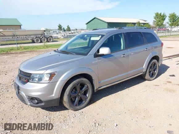 2018 Dodge Journey Crossroad z VIN 3C4PDDGGXJT516948, wystawiony jako IAAI lot #42930202 z przebiegiem 91 933 mil mil oraz . Historia ofert i sprzedaży dostępna na DreamBid. Obrazek 2.