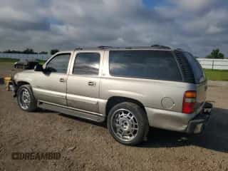 2000 Chevrolet Suburban LT z VIN 3GNEC16T0YG143890, wystawiony jako Copart lot #72273534 z przebiegiem 242 305 mil mil oraz Szkoda całkowita • Salvage title. Historia ofert i sprzedaży dostępna na DreamBid. Obrazek 2.