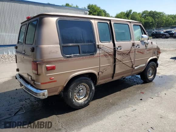 1995 Chevrolet Chevy Van с VIN 1GBEG25Z4SF163727, выставлен на аукционе Copart как лот 68193485 с пробегом 165 321 миль миль и Списание • Salvage title. История ставок и продаж доступна на DreamBid. Изображение 3.