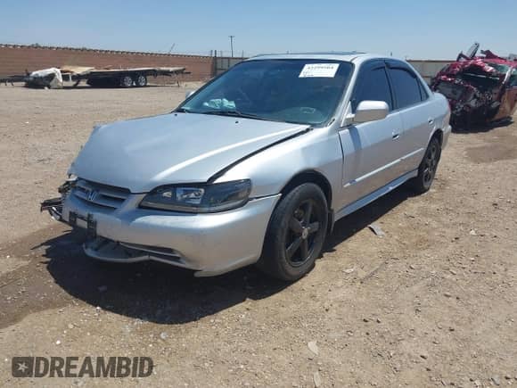 2002 Honda Accord EX with VIN 1HGCG16542A037388, listed as a IAAI auction lot 42299504 with 247,378 mi miles and . Bid and sale history available at DreamBid. Image 2.