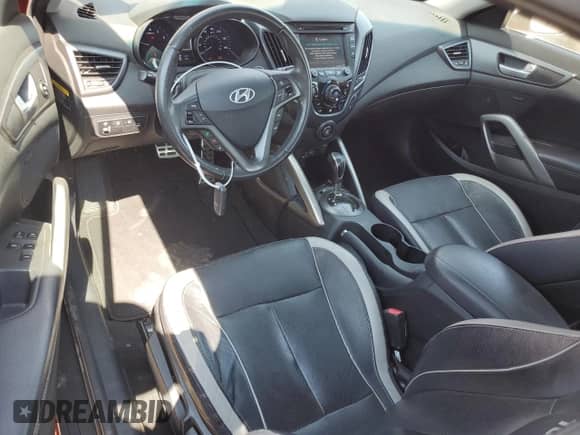 2013 Hyundai Veloster Turbo с VIN KMHTC6AE4DU106074, выставлен на аукционе Copart как лот 67664655 с пробегом 40 812 миль миль и Списание • Salvage title. История ставок и продаж доступна на DreamBid. Изображение 8.