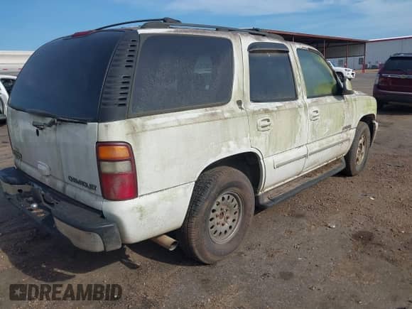 2001 Chevrolet Tahoe LS with VIN 1GNEC13T81J158131, listed as a IAAI auction lot 42735133 with 257,008 mi miles and . Bid and sale history available at DreamBid. Image 4.