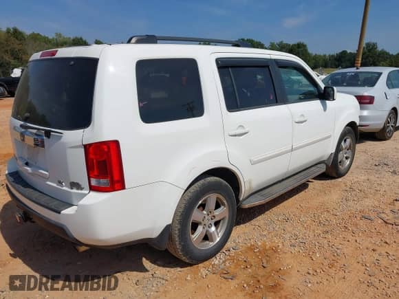 2009 Honda Pilot EX with VIN 5FNYF38499B025634, listed as a IAAI auction lot 43269043 with 226,952 mi miles and . Bid and sale history available at DreamBid. Image 4.