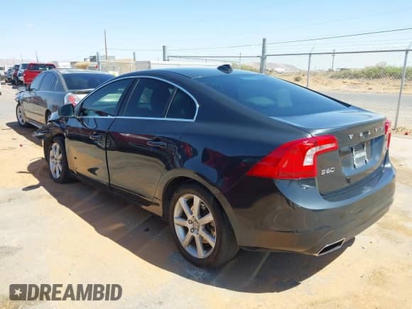 2016 Volvo S60 T5 Drive-E Premier z VIN YV126MFK4G2409957, wystawiony jako IAAI lot #41993257 z przebiegiem 102 420 mil mil oraz . Historia ofert i sprzedaży dostępna na DreamBid. Obrazek 3.