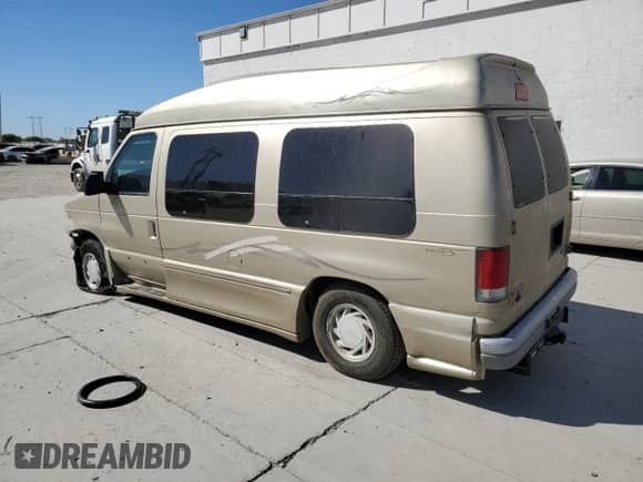 2000 Ford Econoline Cargo Recreational with VIN 1FDRE14LXYHA20588, listed as a Copart auction lot 69209465 with 119,598 mi miles and Salvage title. Bid and sale history available at DreamBid. Image 2.
