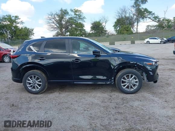 2025 Mazda CX-5 S Select z VIN JM3KFBBL1S0644336, wystawiony jako IAAI lot #43115005 z przebiegiem 4 914 mil mil oraz . Historia ofert i sprzedaży dostępna na DreamBid. Obrazek 13.